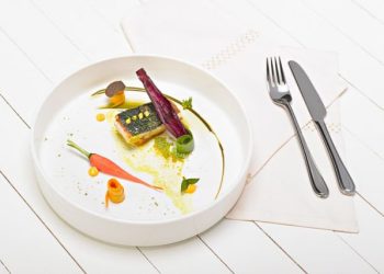 Grilled sturgeon with pandan leaves with turmeric sauce