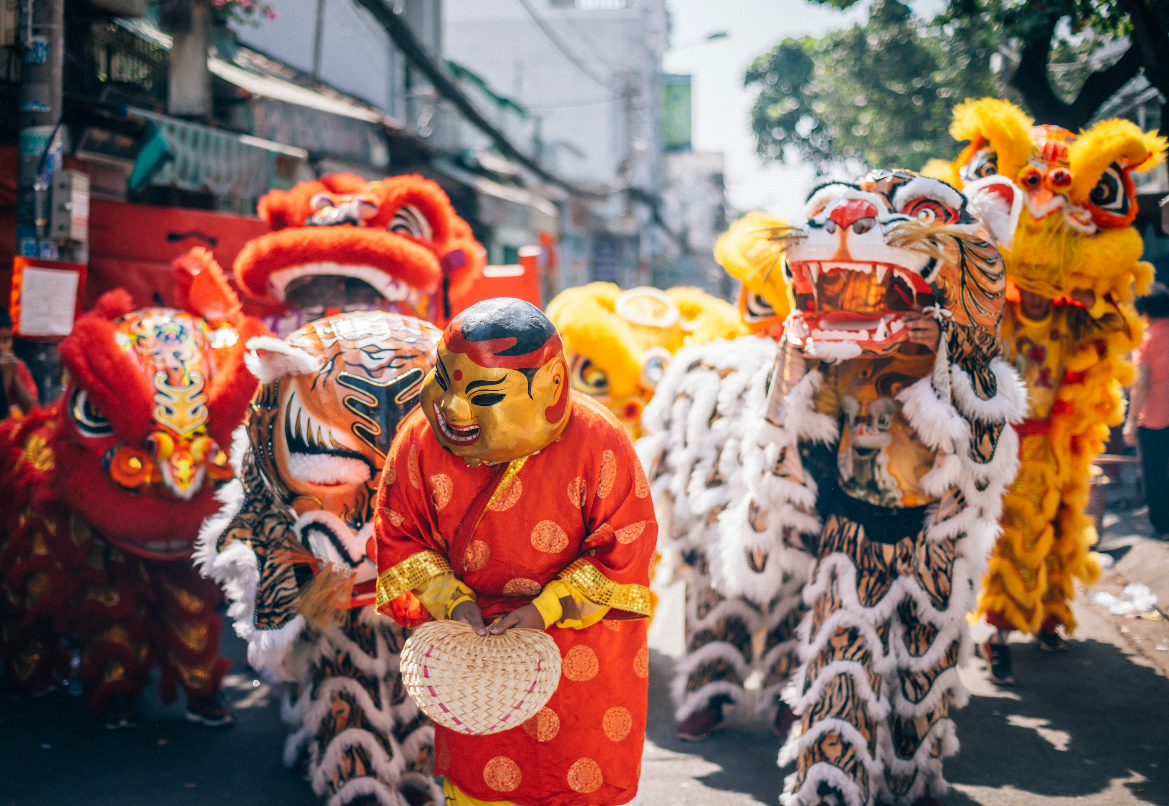 Dancers move through the streets of Ho Chi Minh City during the lunar new year